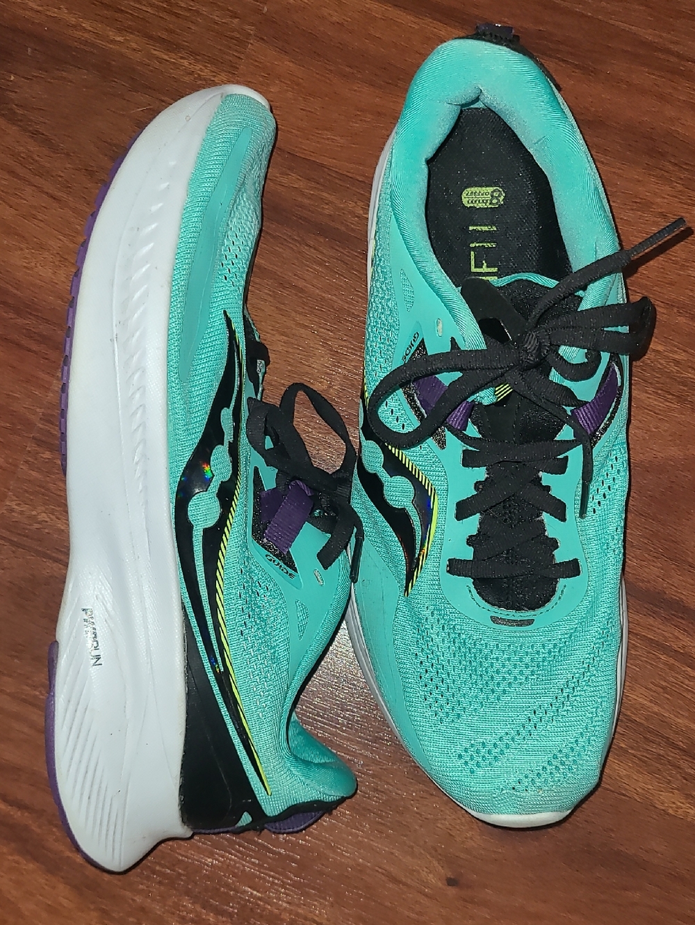 Saucony Women's Teal & Black Running Shoes with Purple Accents
